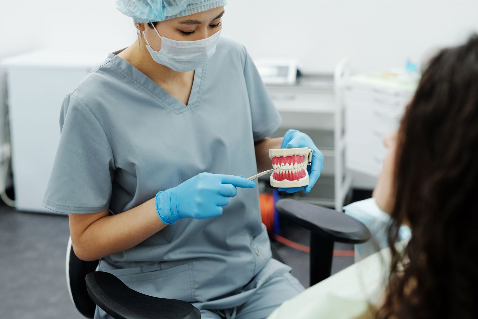 Dentist demonstrating oral care