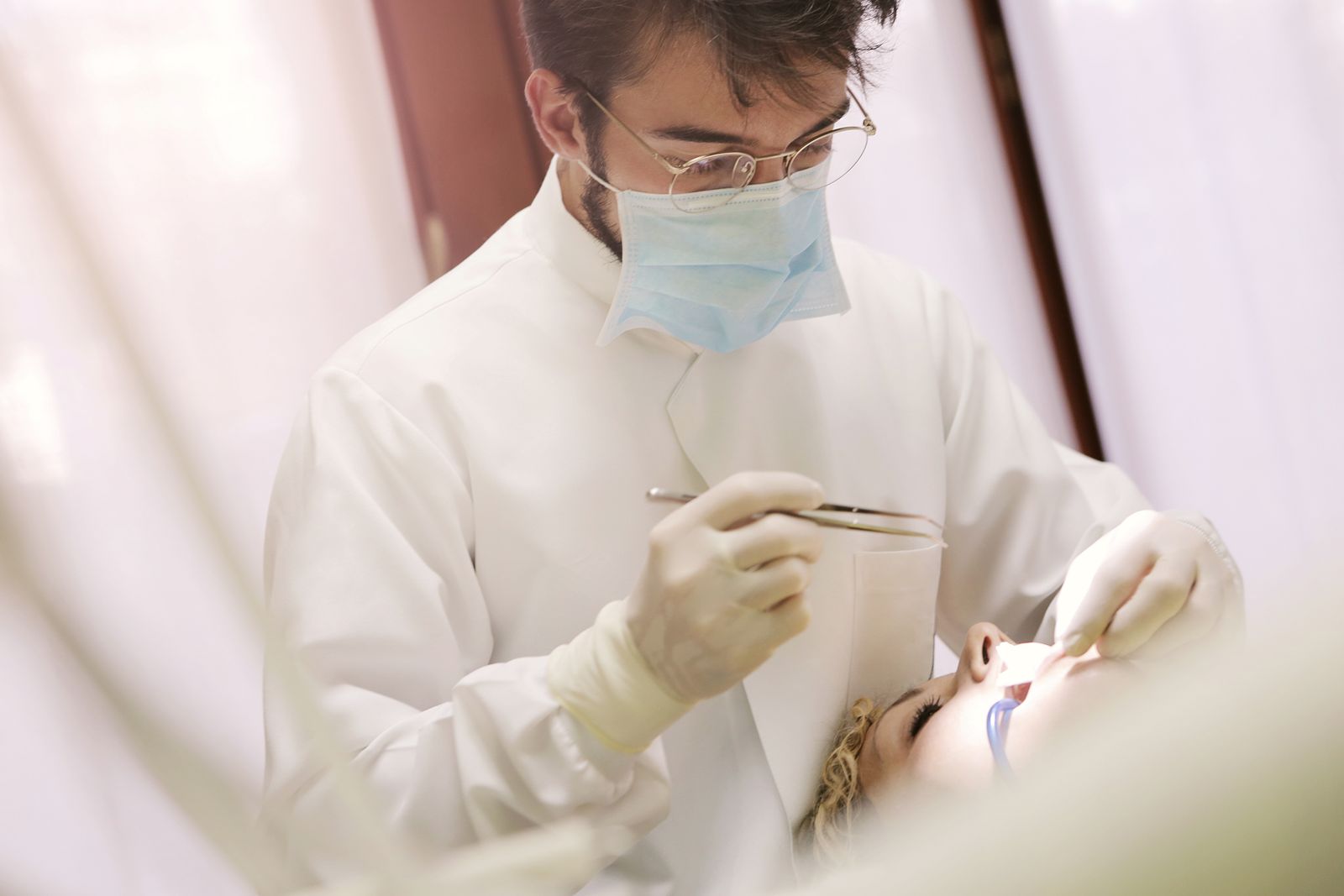 Dentist treating a patient