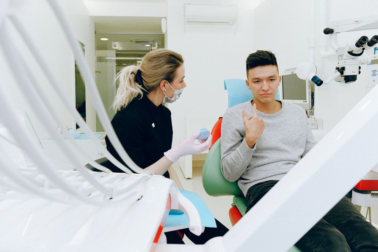 Dentist and patient discussing options
